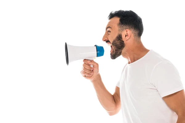 Side view of angry man screaming in megaphone isolated on white — Stock Photo