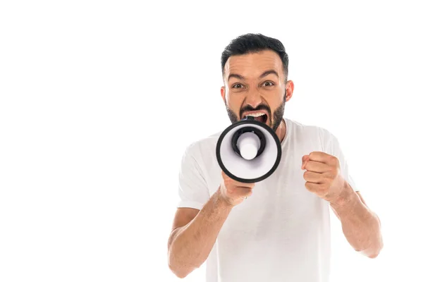 Angry man with clenched fist screaming in megaphone isolated on white — Stock Photo