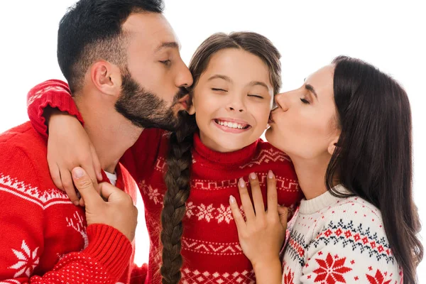 Happy parents kissing cheeks of daughter in sweater isolated on white — Stock Photo
