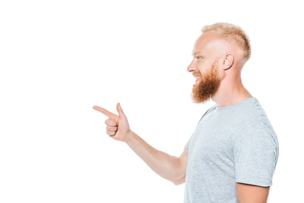 Профиль портрет красивого бородатого мужчины, указывая изолированные на белый — стоковое фото