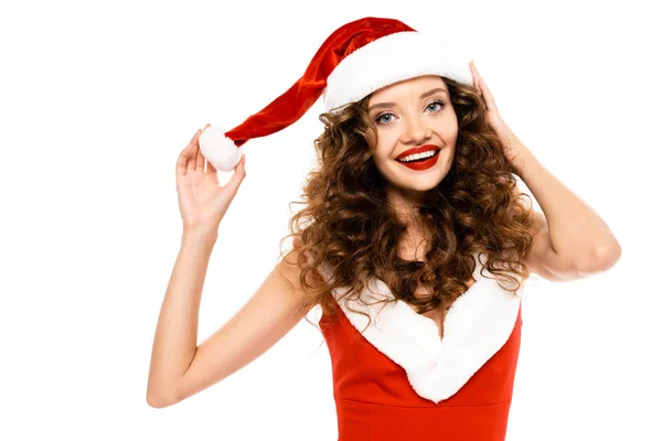 Chica feliz posando en traje de santa y sombrero, aislado en blanco - foto de stock