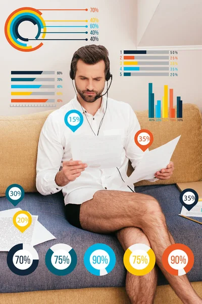 Teleworker in panties and shirt using headset and working with documents on couch in living room, charts and graphs illustration — Stock Photo