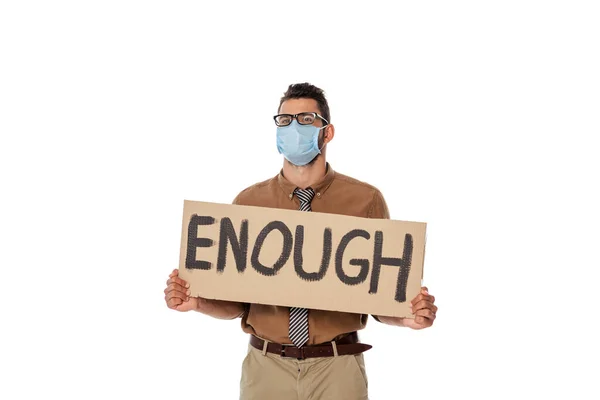 Teacher in eyeglasses and medical mask holding signboard with enough lettering isolated on white — Stock Photo