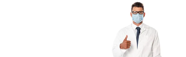 Panoramic crop of doctor in medical mask showing like gesture isolated on white — Stock Photo