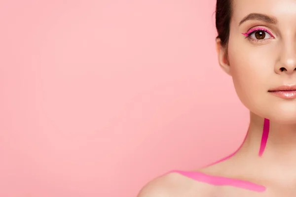 Cropped view of naked beautiful woman with pink lines on body isolated on pink — Stock Photo