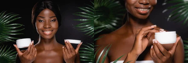 Collage of african american naked woman with cosmetic cream near green palm leaves isolated on black, panoramic shot — Stock Photo