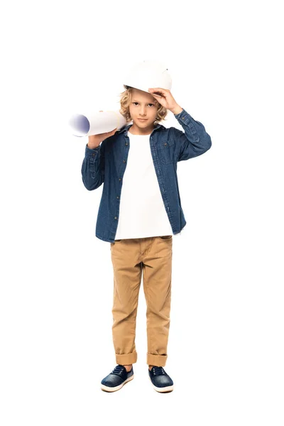 Curly boy in costume of architect touching safety helmet and holding blueprint isolated on white — Stock Photo