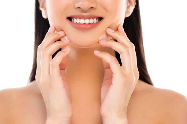 Partial shot of excited young  woman touching face isolated on white — Stock Photo