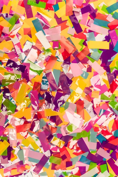 Top view of colorful bright confetti background — Stock Photo