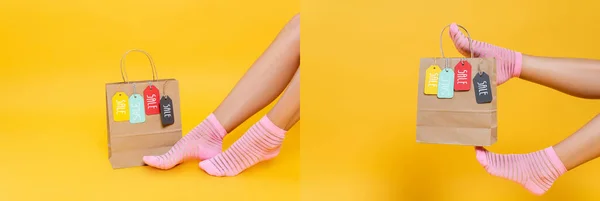 Collage of paper bag with labels near female legs and hanging on woman foot in sock isolated on yellow, banner — Stock Photo