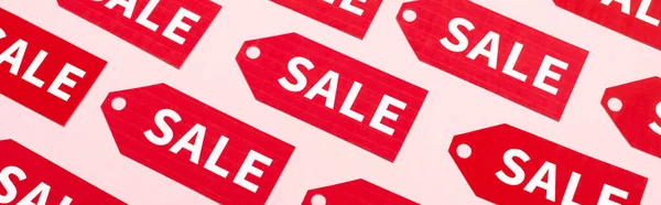 Website header of labels with sale lettering on pink, black friday concept — Stock Photo