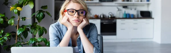 Upset blonde woman in eyeglasses working from home, horizontal banner — Foto stock