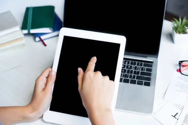 Cropped view of woman pointing with finger at digital tablet — Stock Photo