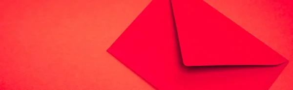 Top view of envelope on red background, banner — Stock Photo