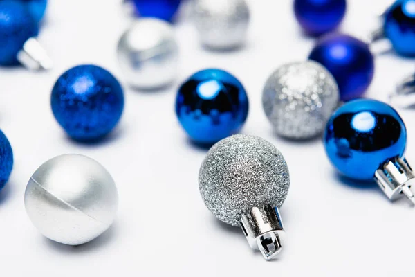 Blue, silver Christmas decoration on white background — Stock Photo