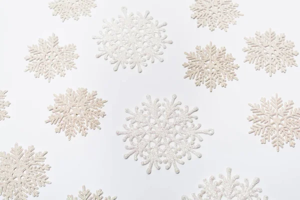 Composition with winter snowflakes on white background — Stock Photo