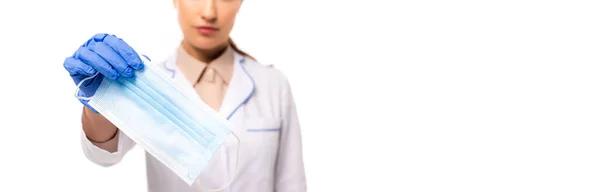 Panoramic crop of doctor in latex glove showing medical mask isolated on white — Stock Photo