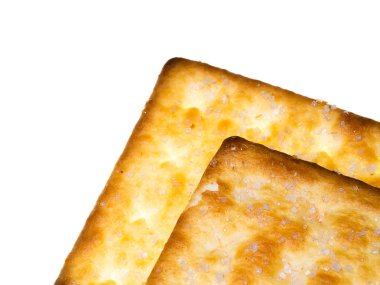 Beyaz arka planda şekerli bisküvi kadar kapatın