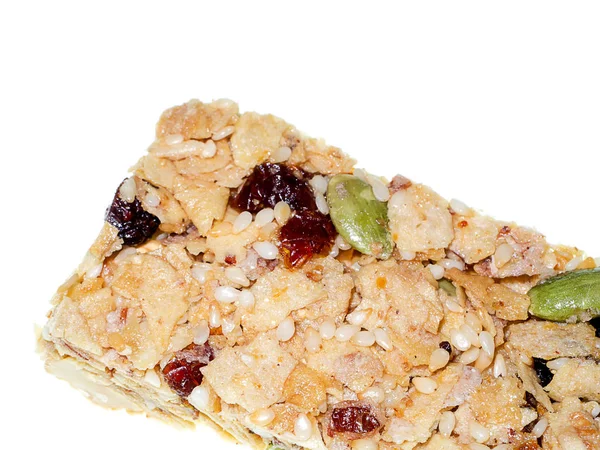 Close up Mixture of grains and fruits cereal bar on white background.