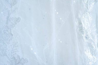 Hassas beyaz düğün elbise arka plan tasarım merkezi yeri olan yumuşak odak kapatın.