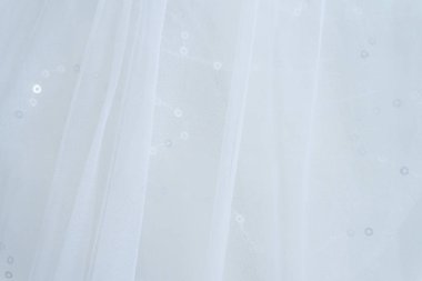 Hassas beyaz düğün elbise arka plan yumuşak odak kadar kapatın.