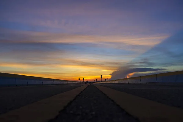 Twilight sky with silhouette of the road. — Stock Photo, Image