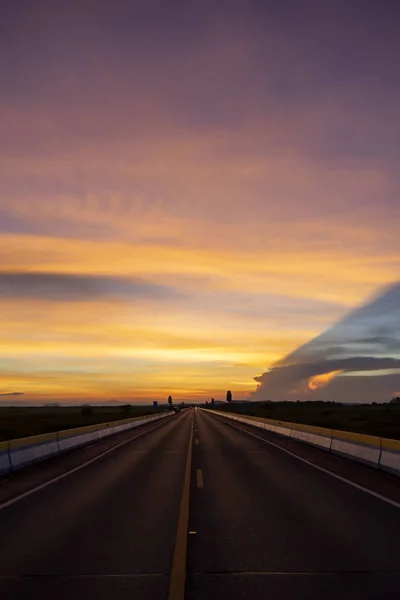 Twilight sky with silhouette of the road. — Stock Photo, Image