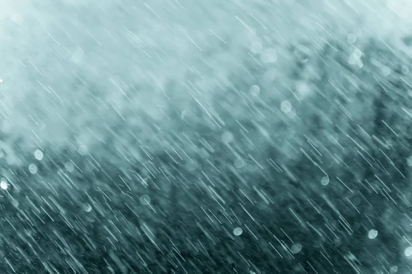 Abstrato chuva cair e fundo bokeh . — Fotografia de Stock