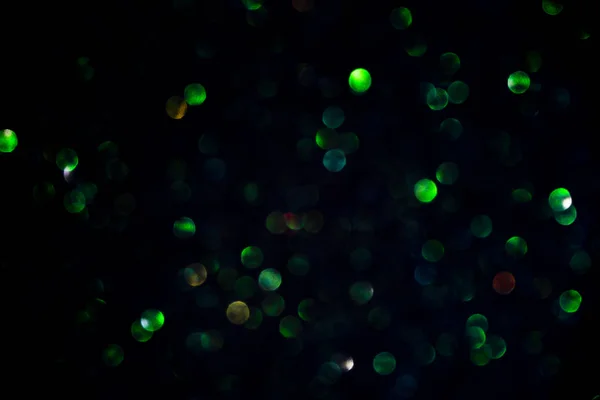 Csillogó glitter bokeh háttérben fény. — Stock Fotó