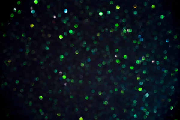 Jiskřivé glitter bokeh pozadí se světlem. — Stock fotografie