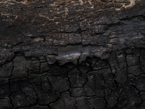 Het oppervlak van houtskool achtergrond. — Stockfoto