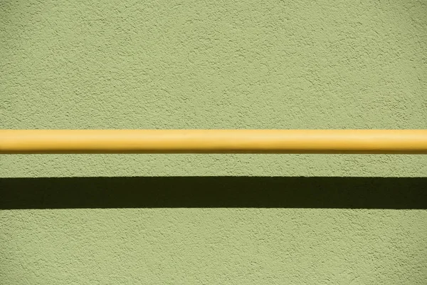 Imagem Quadro Completo Parede Pedra Verde Com Fundo Amarelo Sombra — Fotografia de Stock