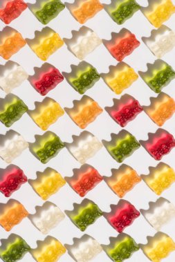 full frame shot of sweet gummy bears pattern on white clipart