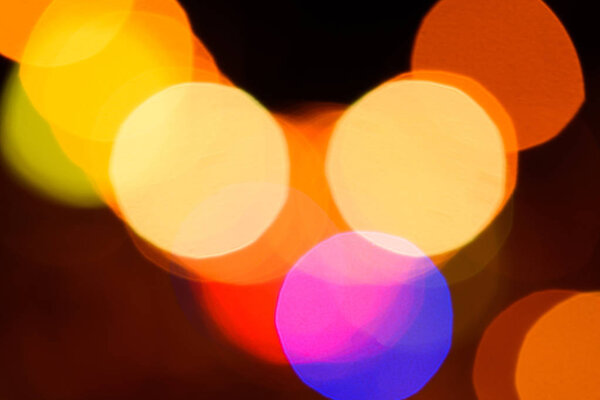 close up view of colorful bokeh lights as background