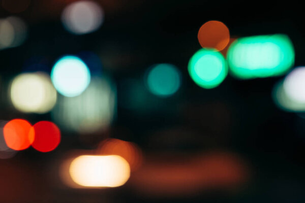 close up view of colorful bokeh lights as background