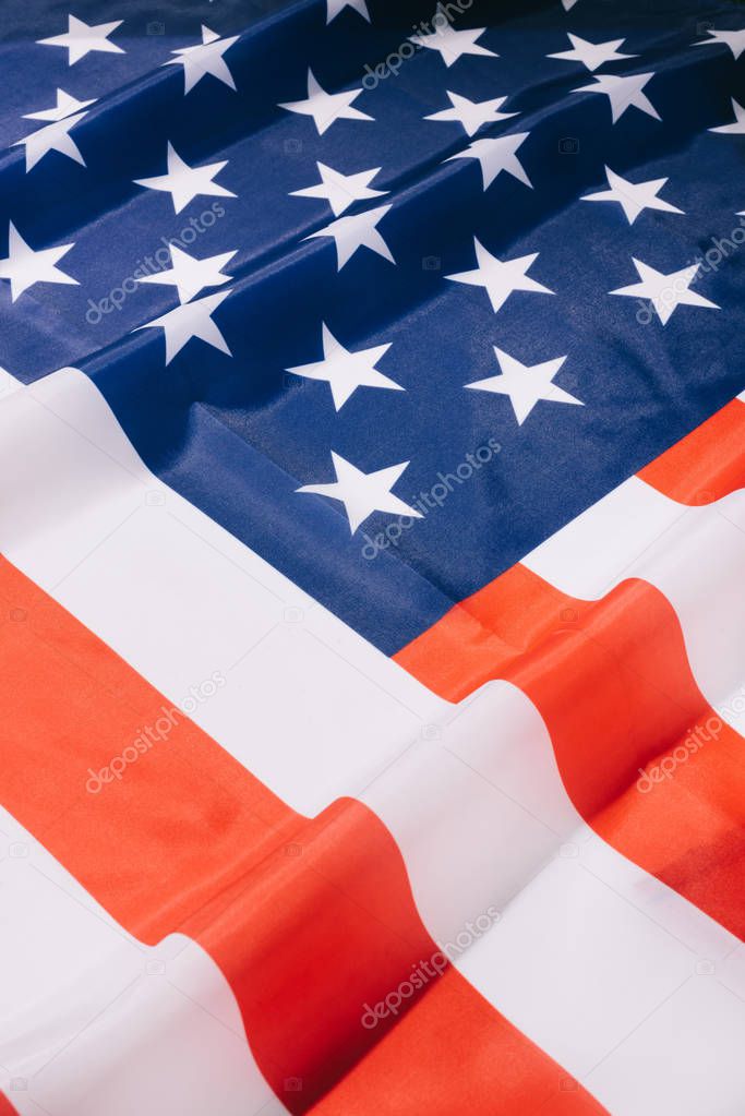 close up view of folded american flag background