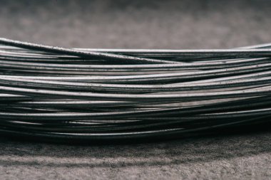 selective focus of grey wires on tabletop clipart
