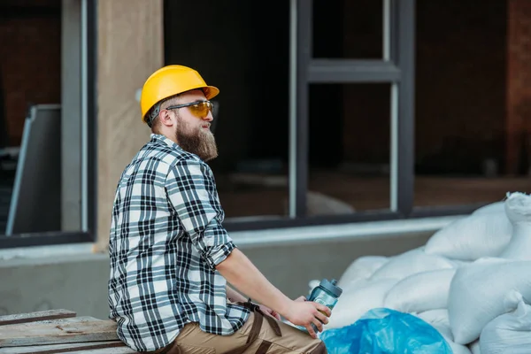 Side View Builder Protective Googles Hardhat Resting Bottle Water Construction — Stock Photo, Image