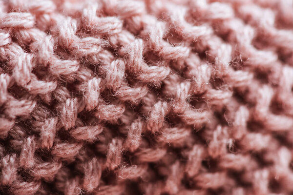 full frame image of pink woolen fabric background