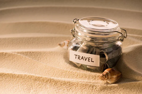 Close View Glass Jar Dollars Sandy Beach Seashells Traveling Concept — Stock Photo, Image