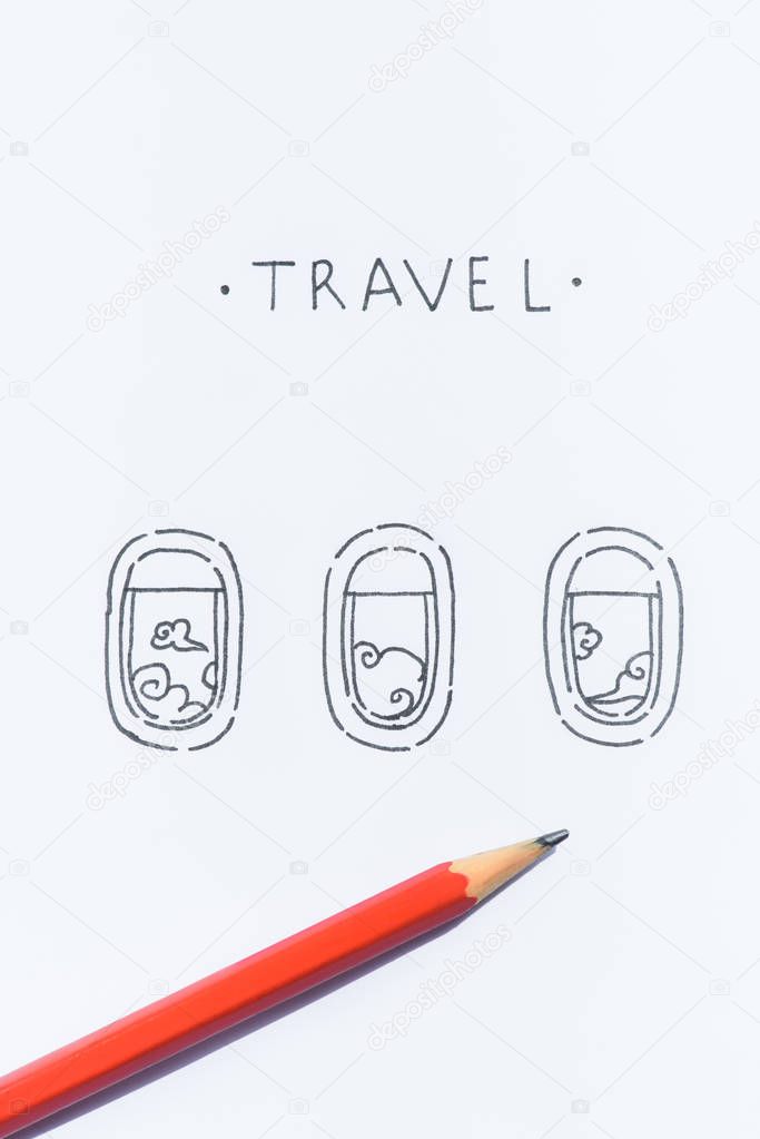 close up view of pencil on white paper with travel lettering and plane windows illustration