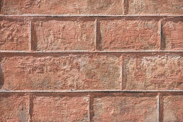 Close View Brown Weathered Brick Wall Background — Free Stock Photo