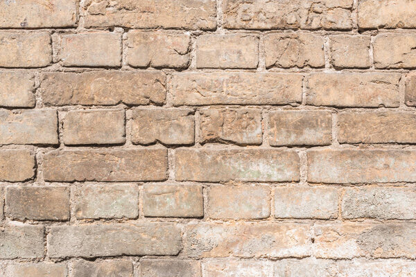 brown aged weathered brick wall background 