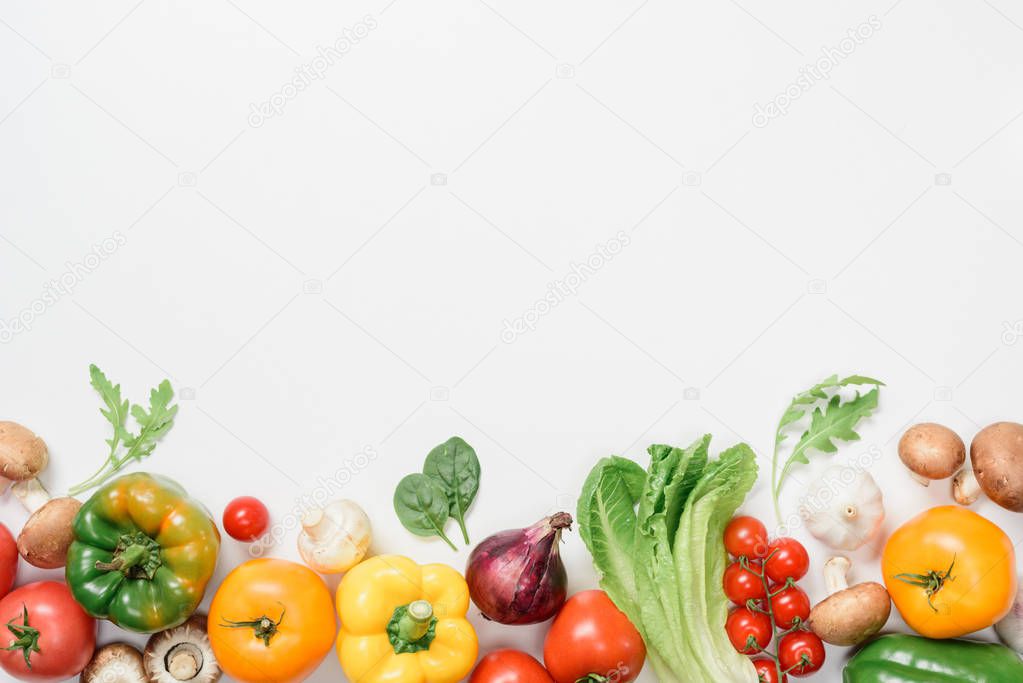 top view of ripe vegetables and herbs isolated on white