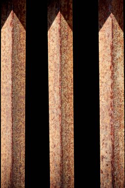 close up view of rust fence with black background behind clipart