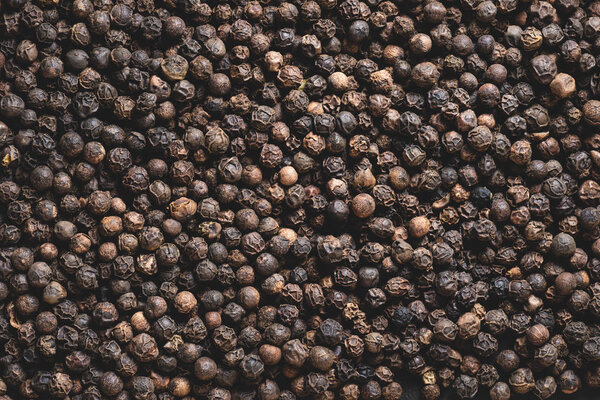 full frame view of dried aromatic peppercorns background