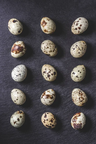 Top View Raw Organic Unshelled Quail Eggs Black — Free Stock Photo