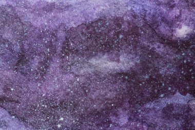 full frame image of universe painting with purple watercolor paint as space clipart