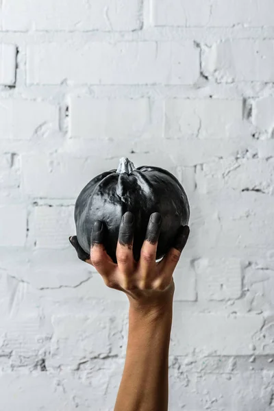 Cropped Shot Woman Holding Black Painted Halloween Pumpkin Front White — Free Stock Photo
