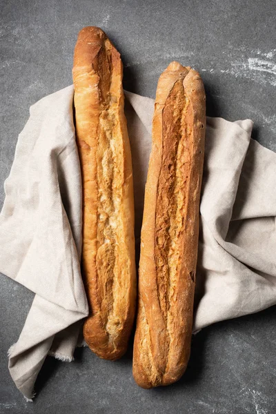 Top View Baguettes Linen Grey Tabletop — Free Stock Photo